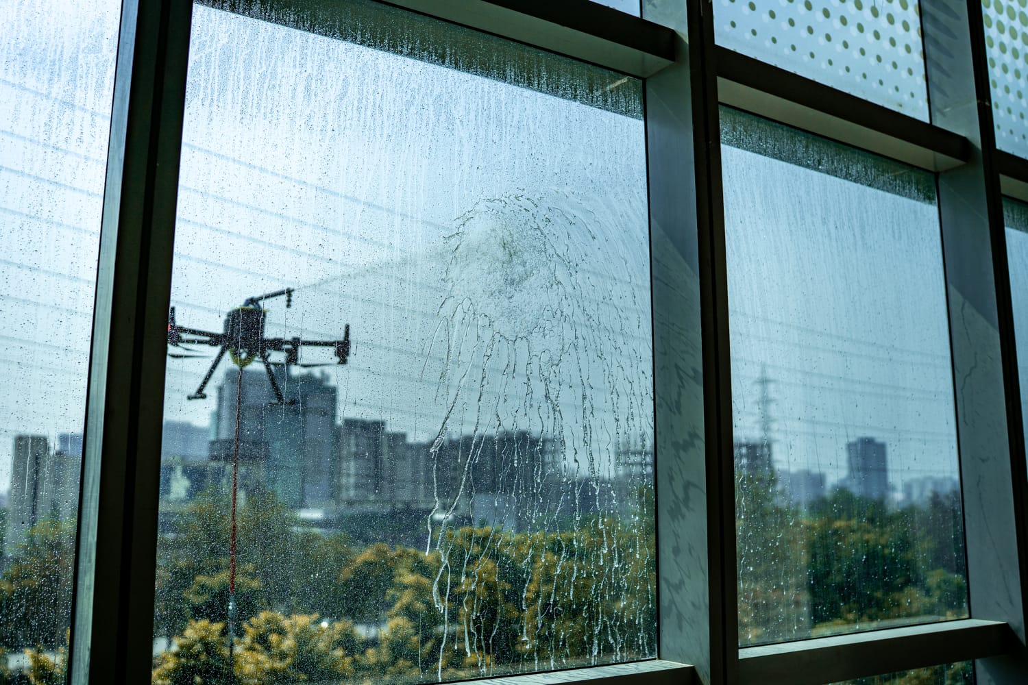View from inside while drone finishes a window clean